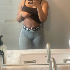 grey nike pros in a size small